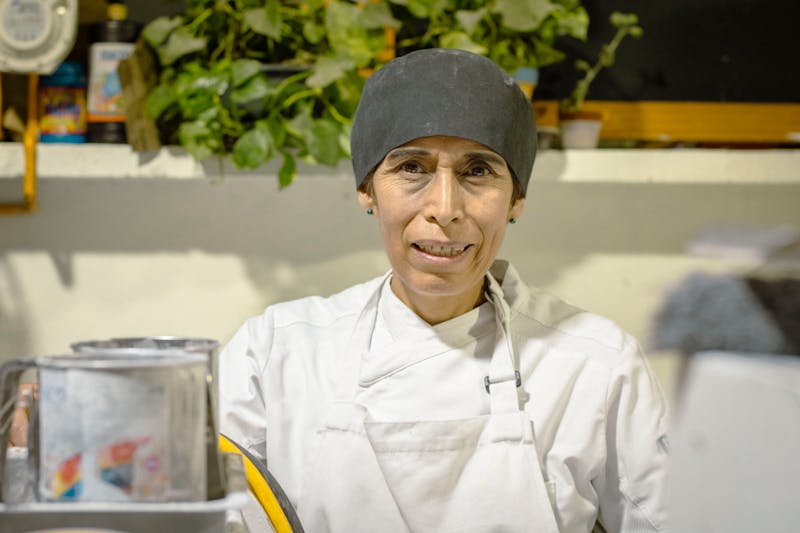 Maria Reyes, Head Chef at Via 313 crafting authentic pizza recipes